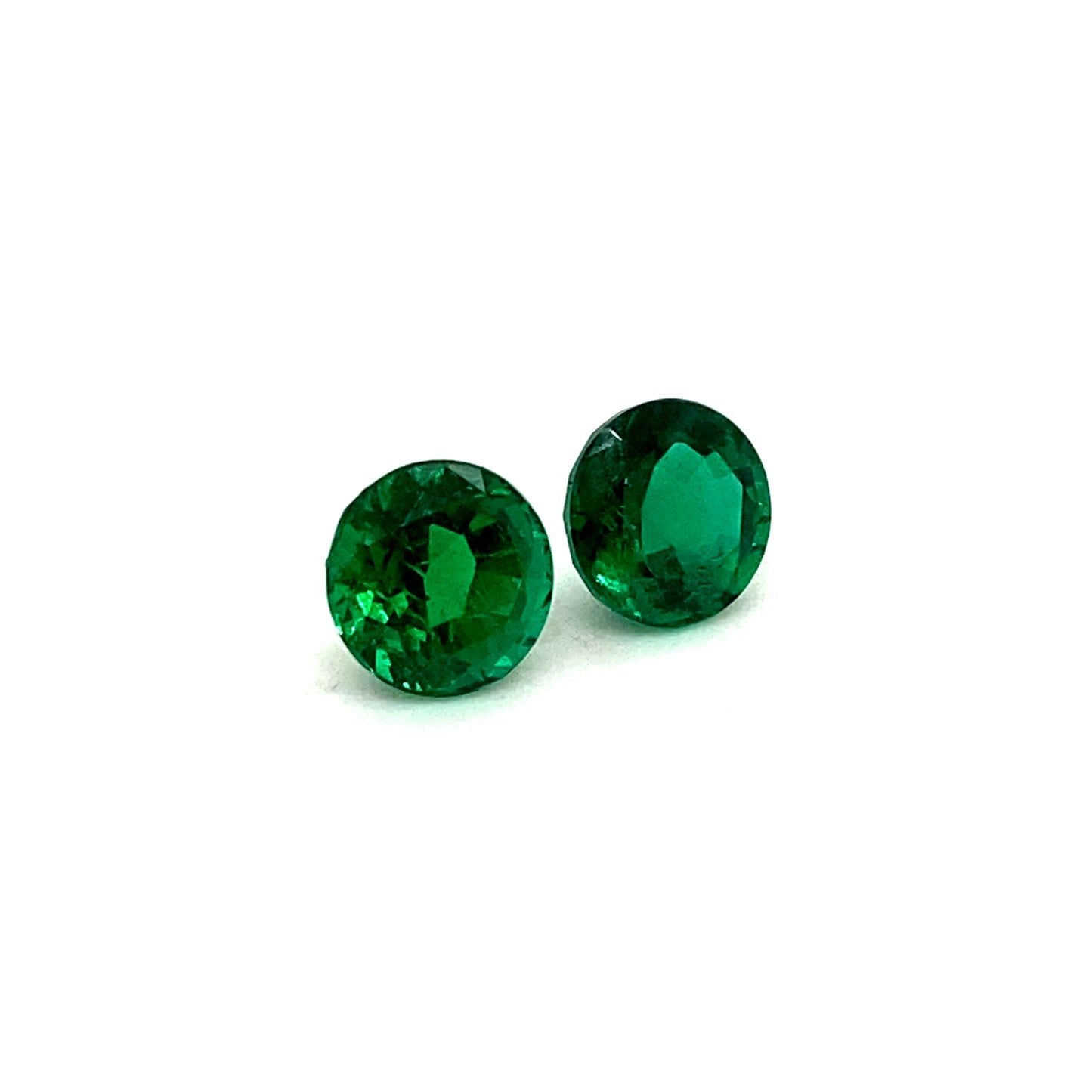 
                  
                    7.62x7.67x5.68mm Round Emerald Pair (2 pc 3.63 ct)
                  
                