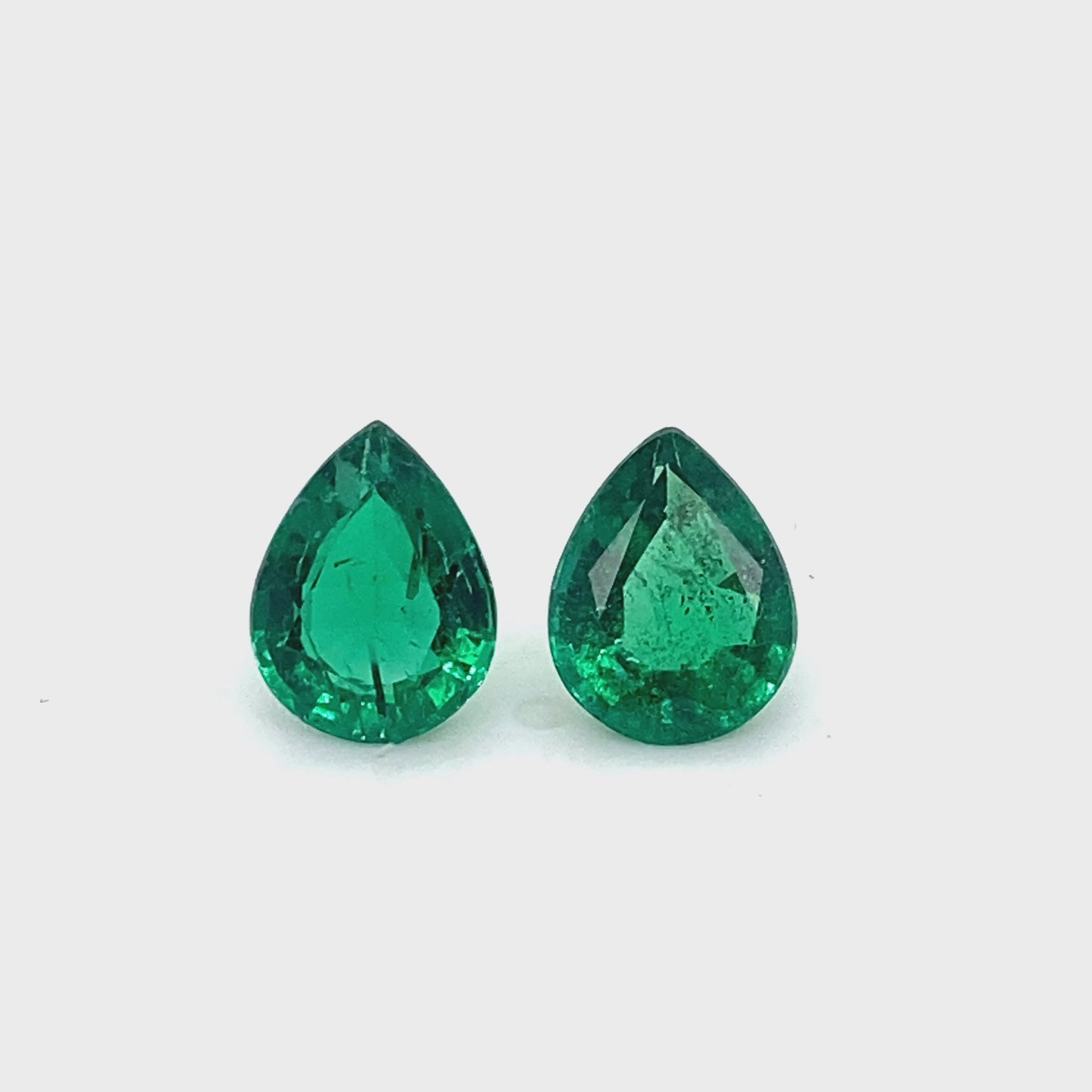 
                  
                    Load and play video in Gallery viewer, 10.00x7.80x4.20mm Pear-shaped Emerald (2 pc 3.64 ct)
                  
                