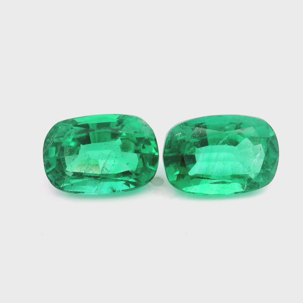 
                  
                    Load and play video in Gallery viewer, 12.80x8.86x7.13mm Cushion Emerald (2 pc 11.28 ct)
                  
                