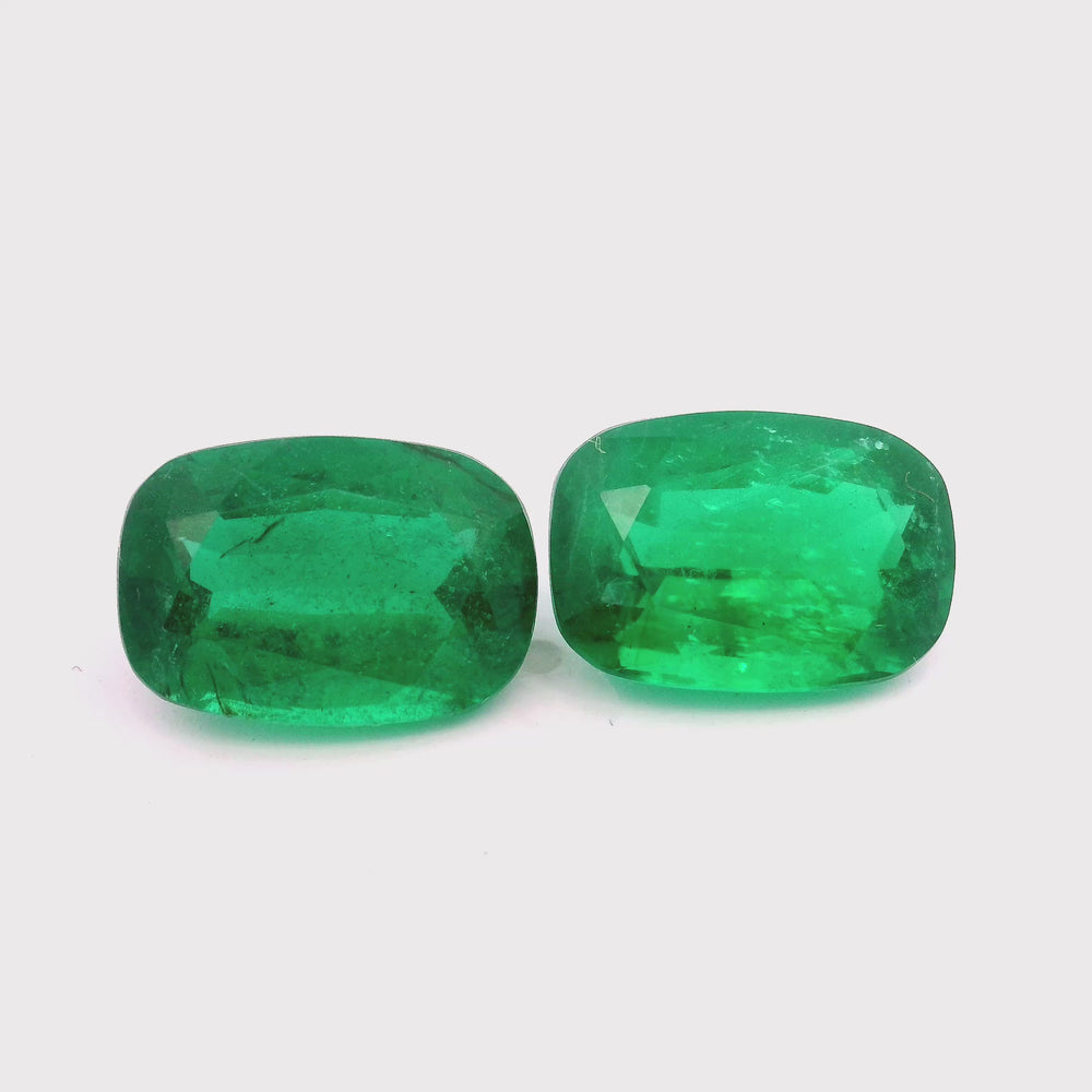 
                  
                    Load and play video in Gallery viewer, 12.93x8.89x6.46mm Cushion Emerald Pair (2 pc 9.83 ct)
                  
                