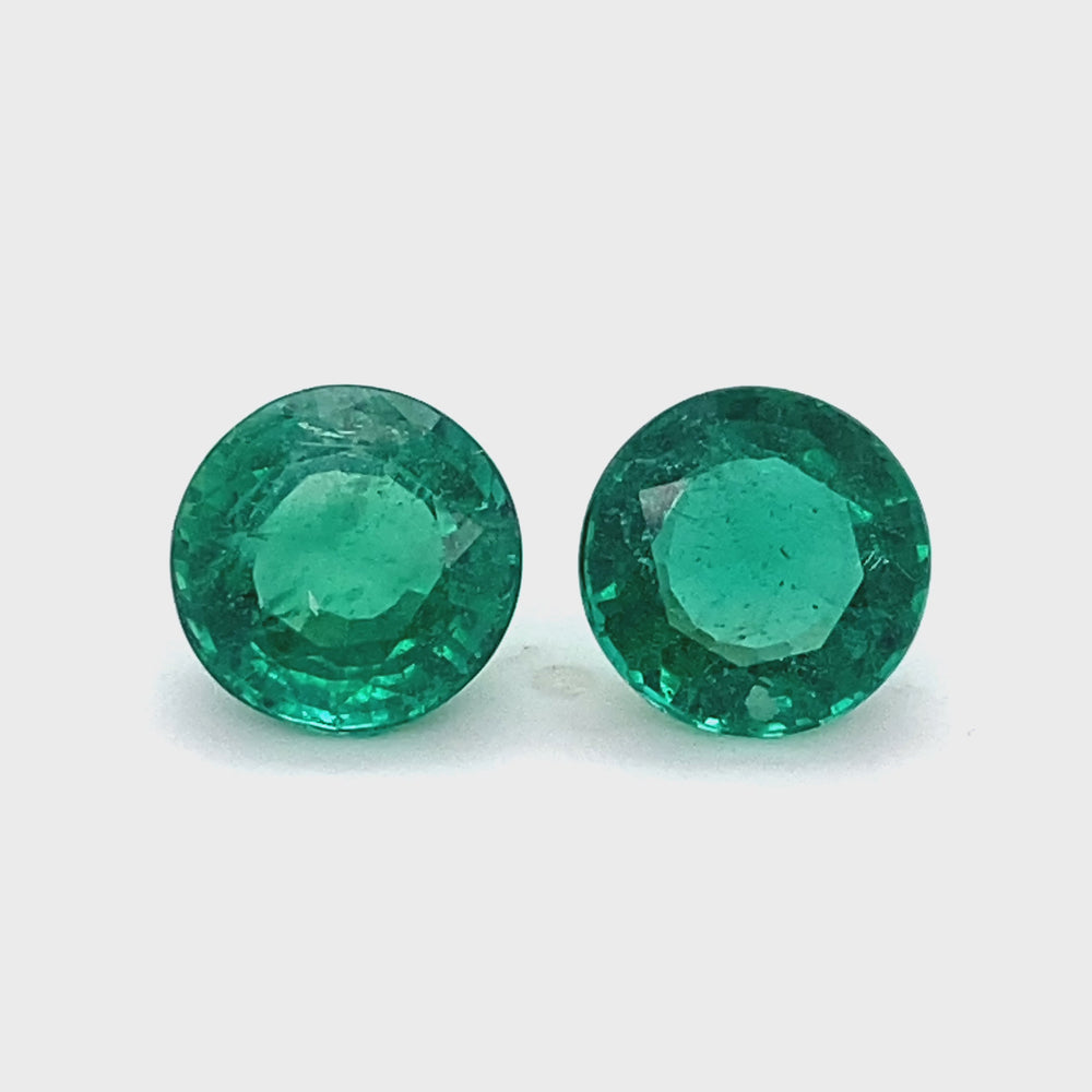 
                  
                    Load and play video in Gallery viewer, 10.34x10.36x5.42mm Round Emerald (2 pc 7.22 ct)
                  
                