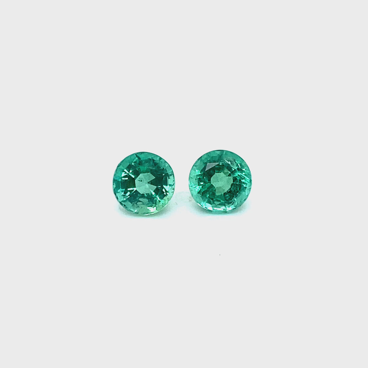 6.30x0.00x0.00mm Round Emerald (2 pc 2.26 ct)