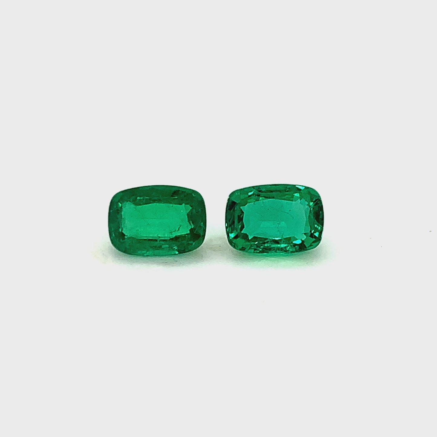 
                  
                    Load and play video in Gallery viewer, 7.50x5.40x7.80mm Cushion Emerald (2 pc 2.05 ct)
                  
                