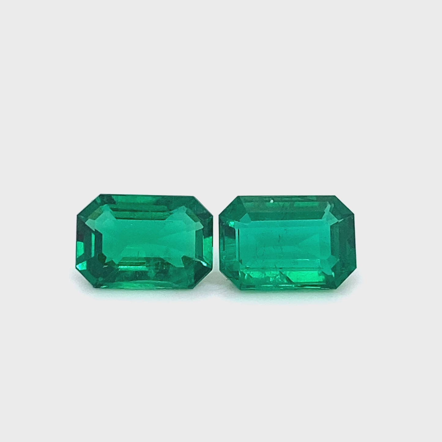 
                  
                    Load and play video in Gallery viewer, 10.97x7.57x4.79mm Octagon Emerald (2 pc 5.92 ct)
                  
                