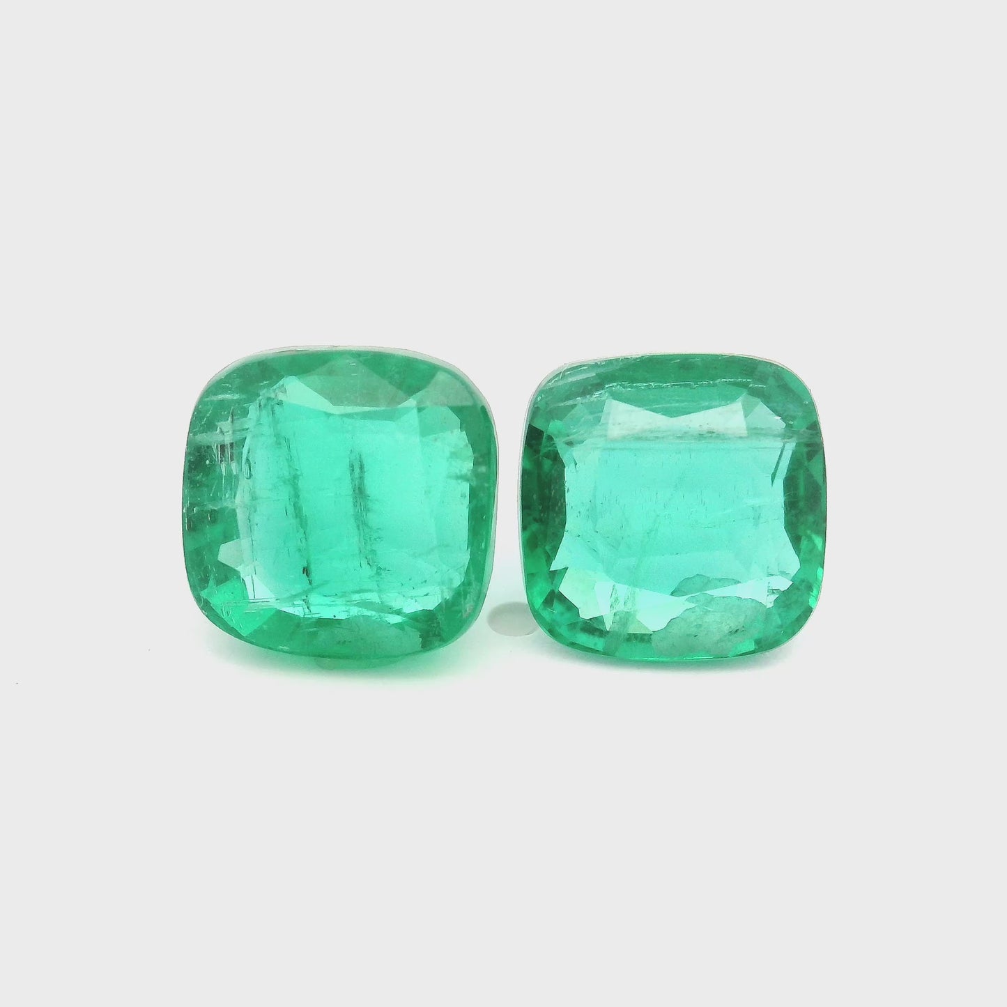 
                  
                    Load and play video in Gallery viewer, 8.44x8.45x0.00mm Cushion Emerald (2 pc 5.48 ct)
                  
                