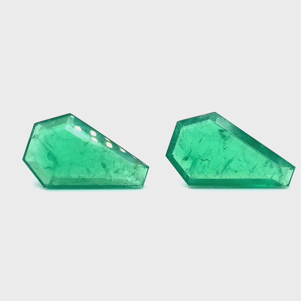 
                  
                    Load and play video in Gallery viewer, 34.78x21.50x7.71mm Fancy Cut Emerald (2 pc 75.82 ct)
                  
                