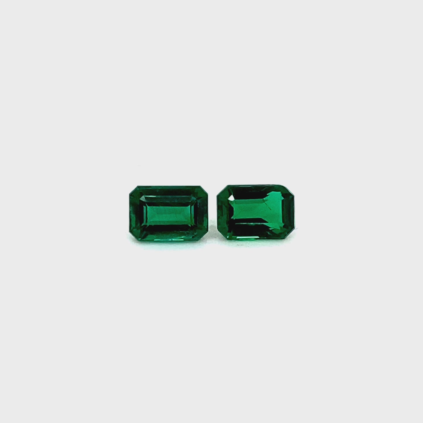 
                  
                    Load and play video in Gallery viewer, 6.90x4.80x3.50mm Octagon Emerald Pair (2 pc 1.74 ct)
                  
                