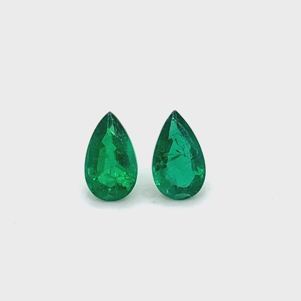 
                  
                    Load and play video in Gallery viewer, 10.10x6.07x3.96mm Pear-shaped Emerald (2 pc 2.83 ct)
                  
                