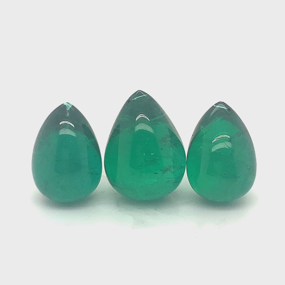 
                  
                    Load and play video in Gallery viewer, Drop Emerald (3 pc 57.83 ct)
                  
                