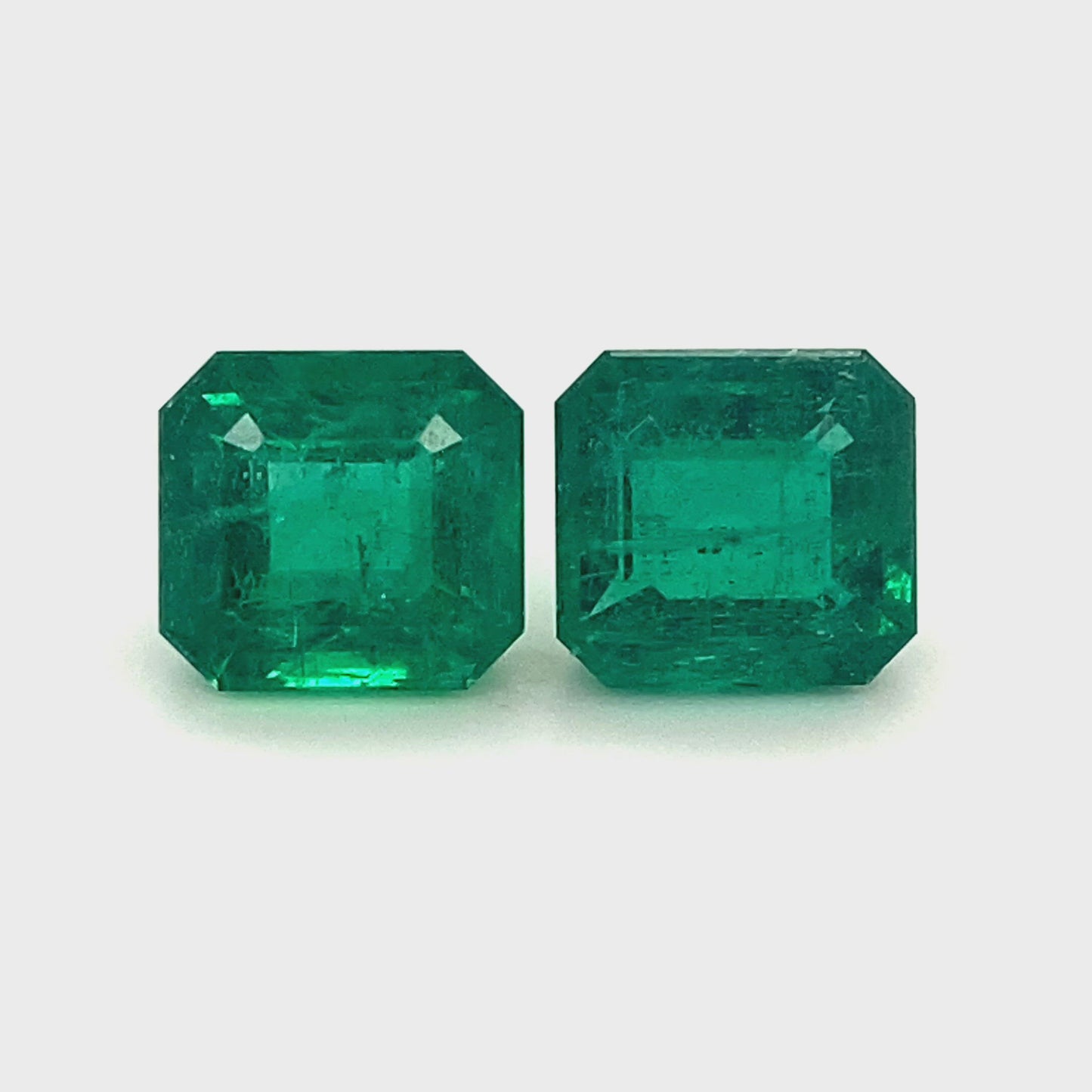 
                  
                    Load and play video in Gallery viewer, 11.83x10.99x7.26mm Octagon Emerald Pair (2 pc 15.01 ct)
                  
                