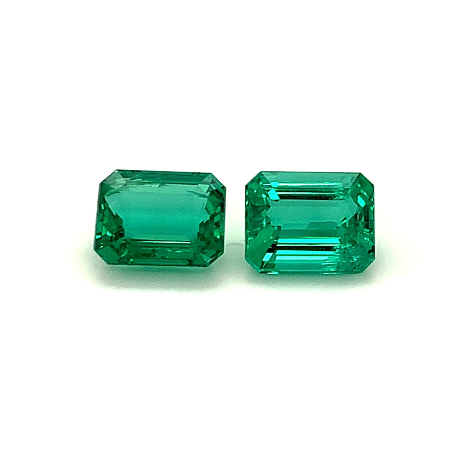 
                  
                    Load and play video in Gallery viewer, 10.52x8.37x5.04mm Octagon Emerald Pair (2 pc 7.37 ct)
                  
                