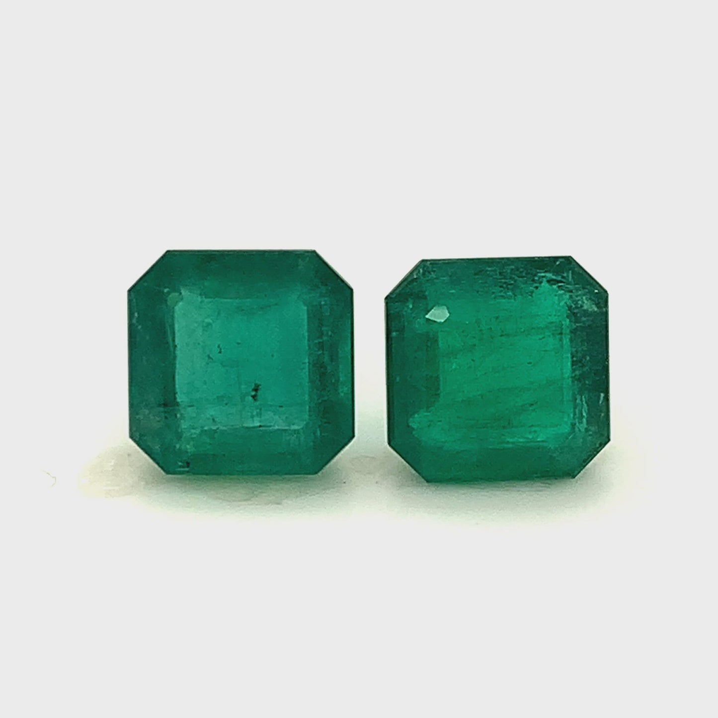 
                  
                    Load and play video in Gallery viewer, 13.20x13.10x0.00mm Octagon Emerald (2 pc 19.82 ct)
                  
                