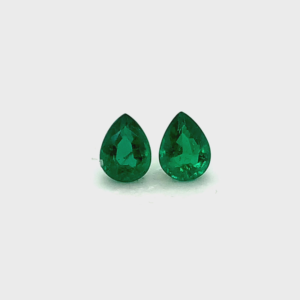 
                  
                    Load and play video in Gallery viewer, 8.10x6.00x0.00mm Pear-shaped Emerald (2 pc 2.45 ct)
                  
                