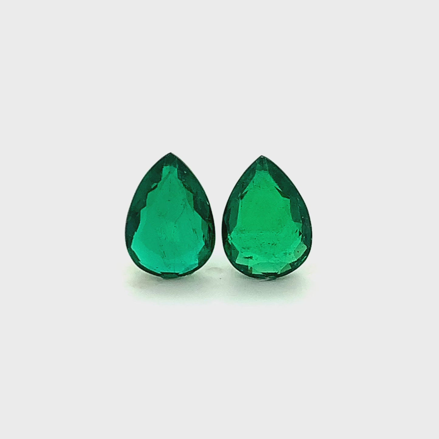 13.66x9.78x5.13mm Pear-shaped Emerald Pair (2 pc 8.47 ct)