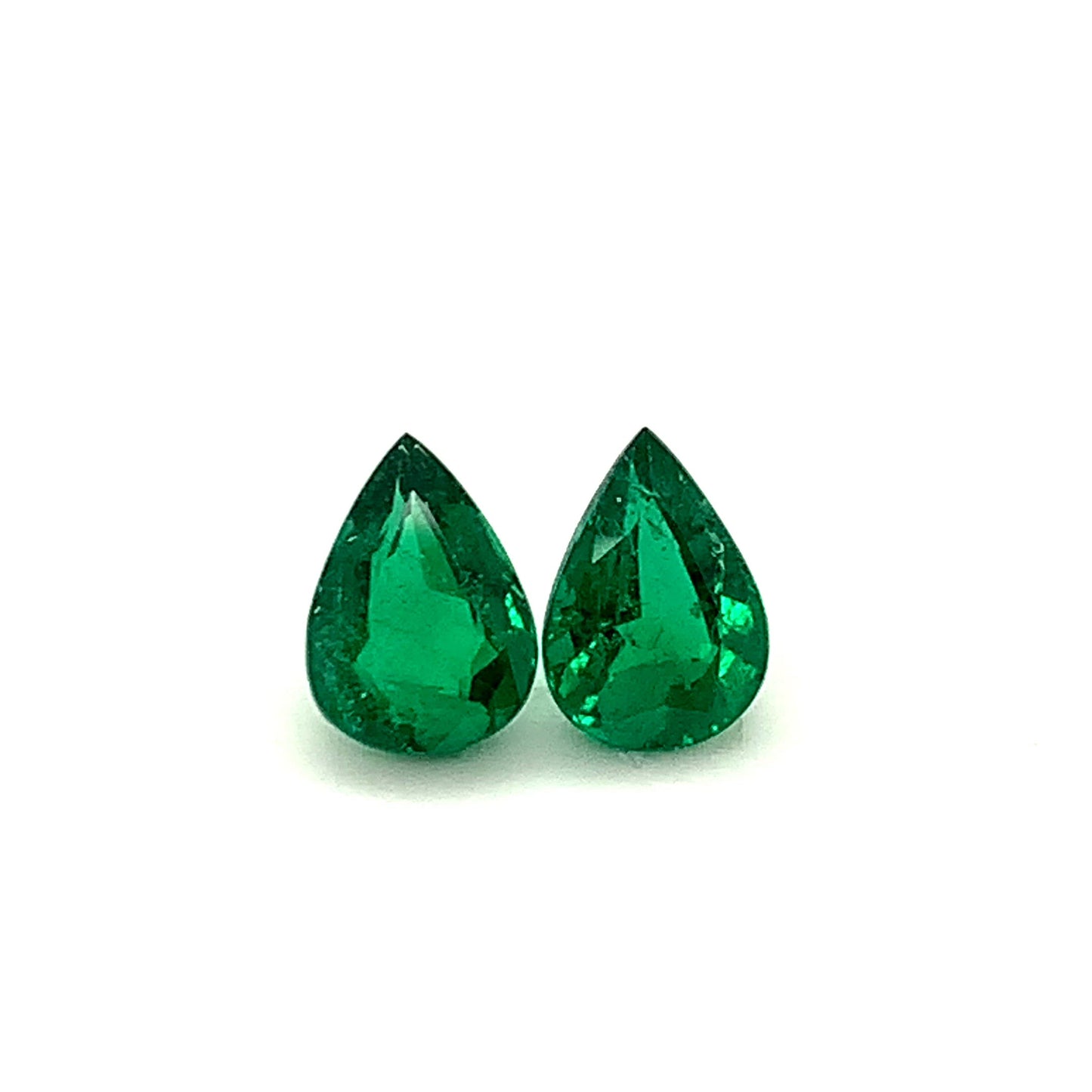 
                  
                    Load and play video in Gallery viewer, 11.55x8.21x5.48mm Pear-shaped Emerald Pair (2 pc 5.42 ct)
                  
                