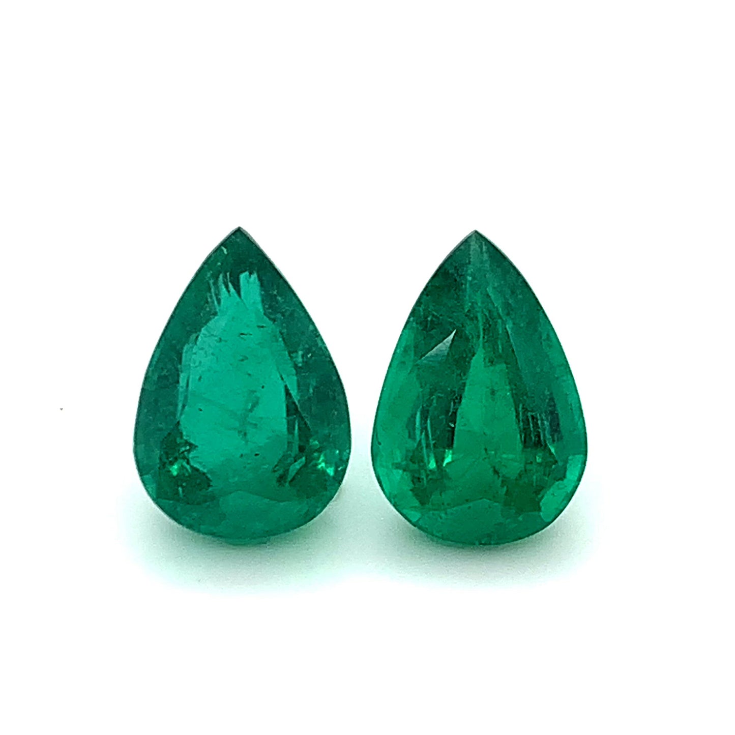 
                  
                    Load and play video in Gallery viewer, 15.18x10.40x7.19mm Pear-shaped Emerald (2 pc 12.89 ct)
                  
                