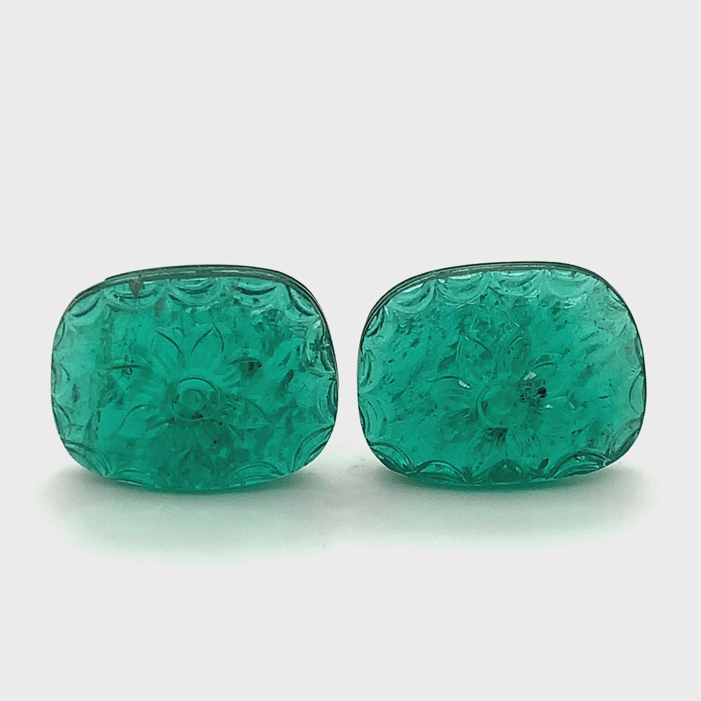 
                  
                    Load and play video in Gallery viewer, 21.61x16.46x6.89mm Carving Emerald Pair (2 pc 42.19 ct)
                  
                
