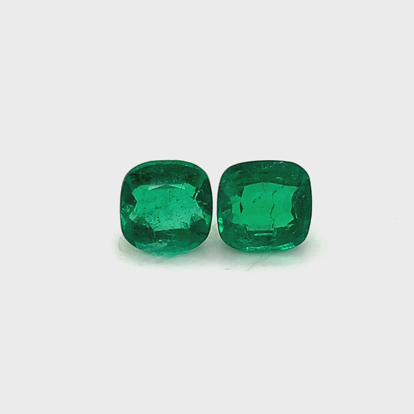 
                  
                    Load and play video in Gallery viewer, 7.60x7.50x0.00mm Cushion Emerald (2 pc 3.56 ct)
                  
                