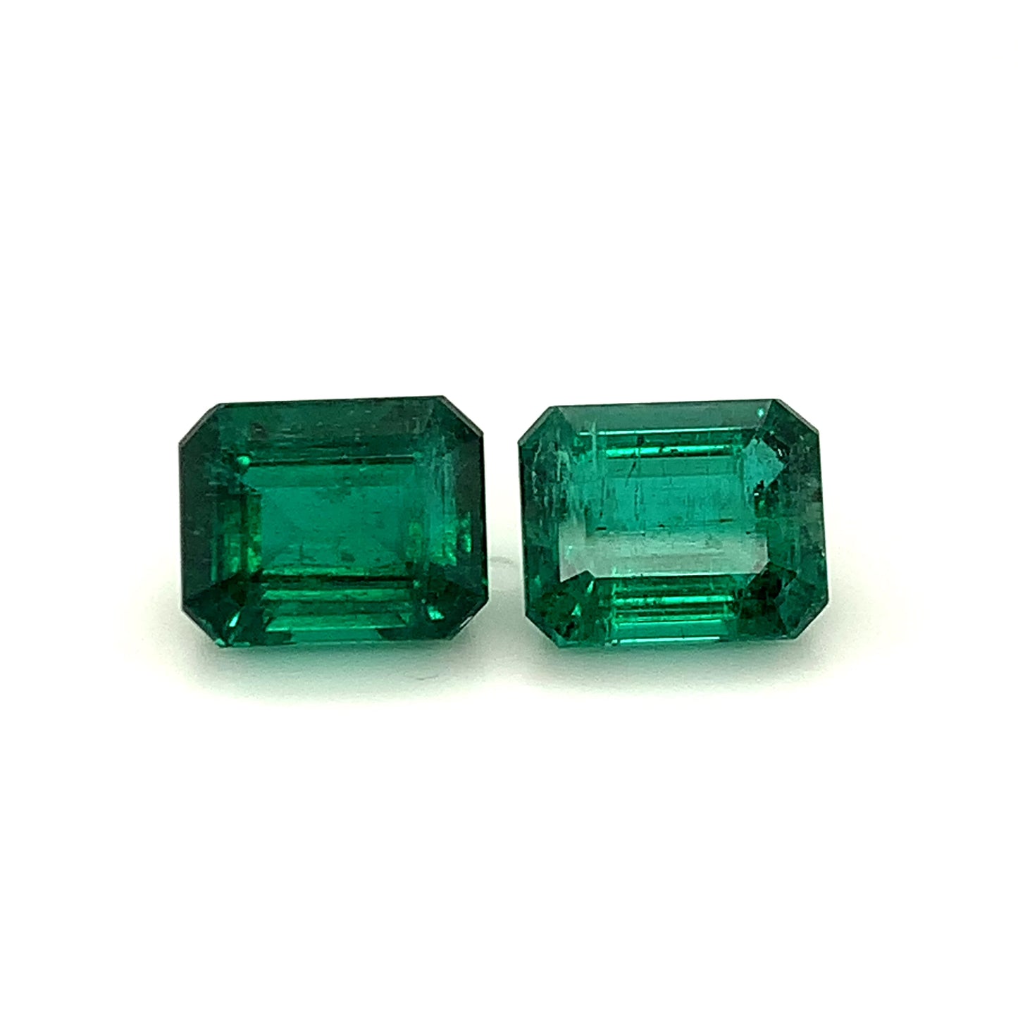 
                  
                    Load and play video in Gallery viewer, 11.85x9.54x6.69mm Octagon Emerald Pair (2 pc 12.48 ct)
                  
                