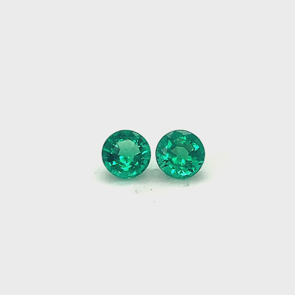 
                  
                    Load and play video in Gallery viewer, 5.50x0.00x0.00mm Round Emerald (2 pc 1.26 ct)
                  
                
