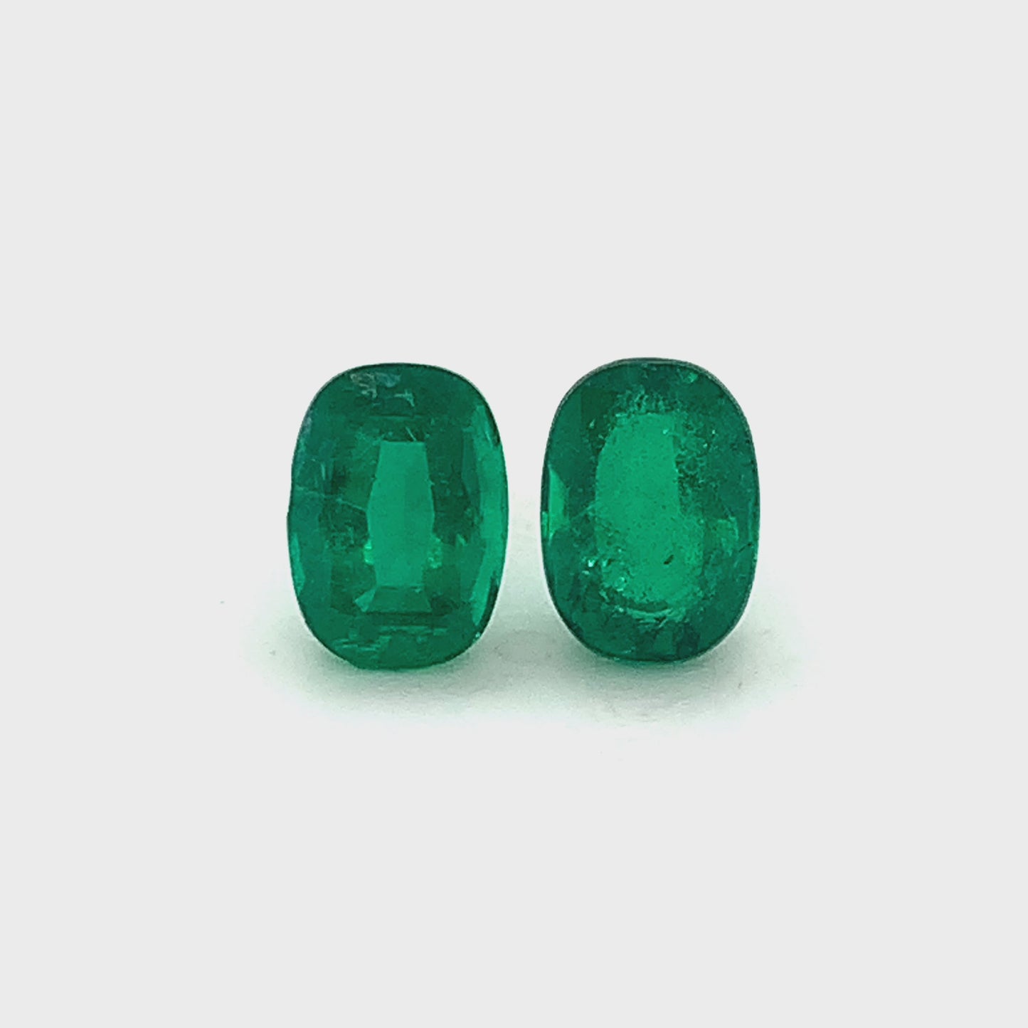 9.50x7.00x0.00mm Cushion Emerald (2 pc 4.57 ct)