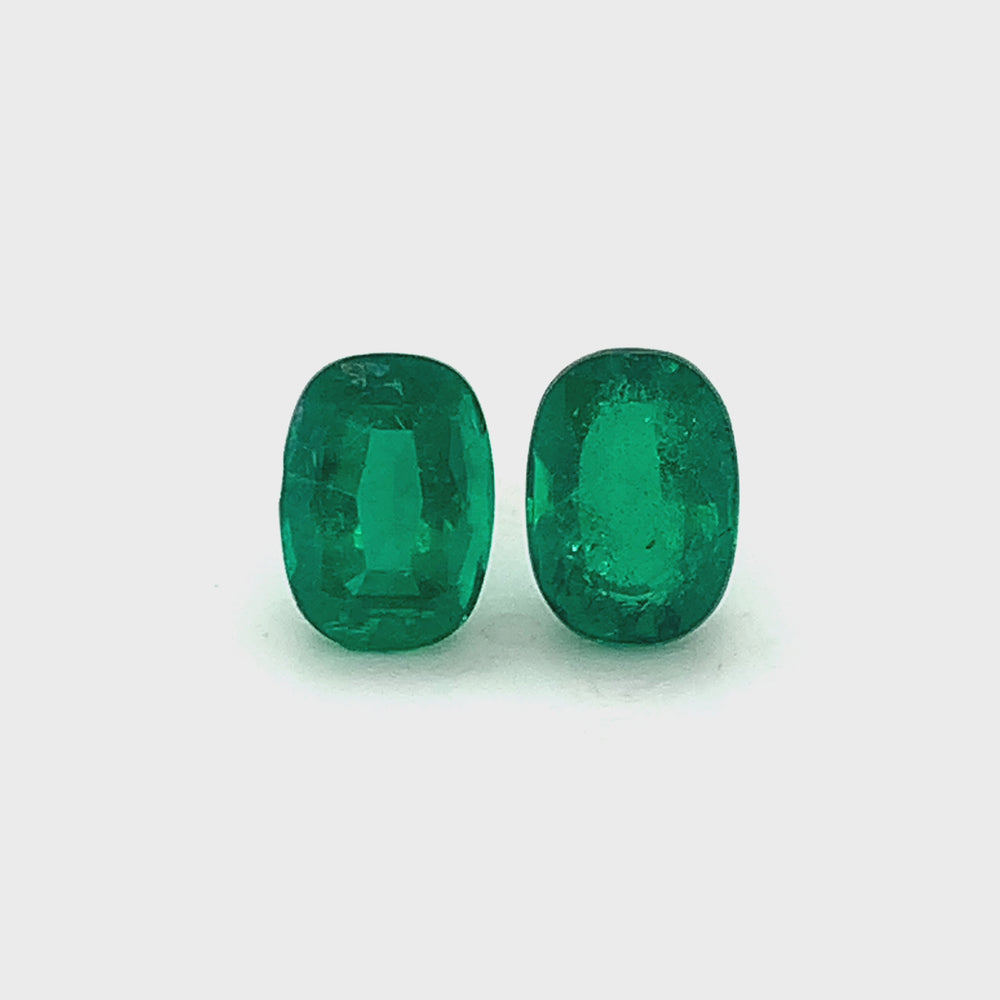 
                  
                    Load and play video in Gallery viewer, 9.50x7.00x0.00mm Cushion Emerald (2 pc 4.57 ct)
                  
                