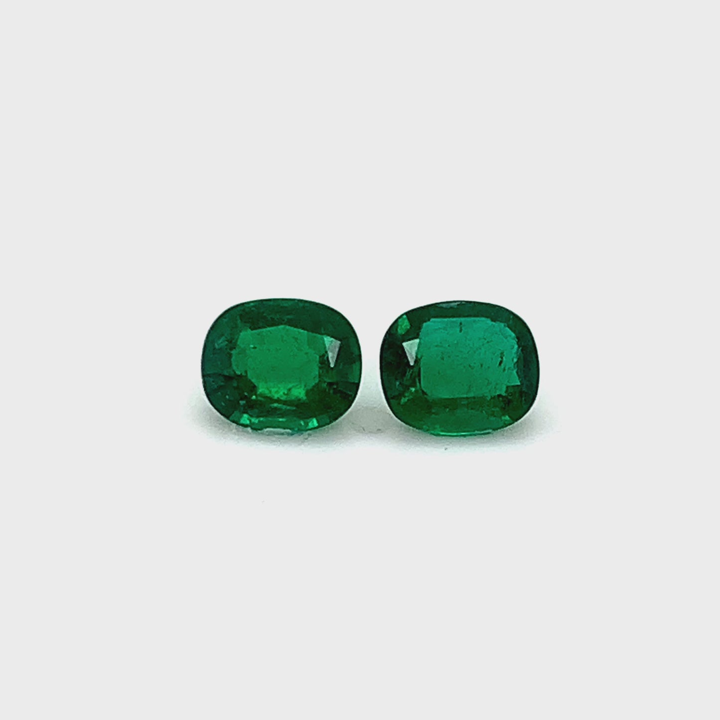 
                  
                    Load and play video in Gallery viewer, 6.50x5.40x0.00mm Cushion Emerald (2 pc 1.32 ct)
                  
                