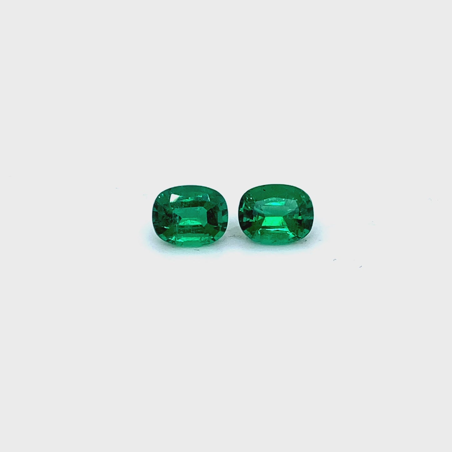 
                  
                    Load and play video in Gallery viewer, 6.30x5.10x0.00mm Cushion Emerald (2 pc 1.45 ct)
                  
                