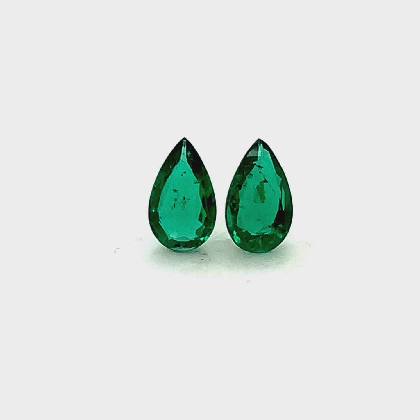 9.70x5.70x0.00mm Pear-shaped Emerald (2 pc 2.11 ct)