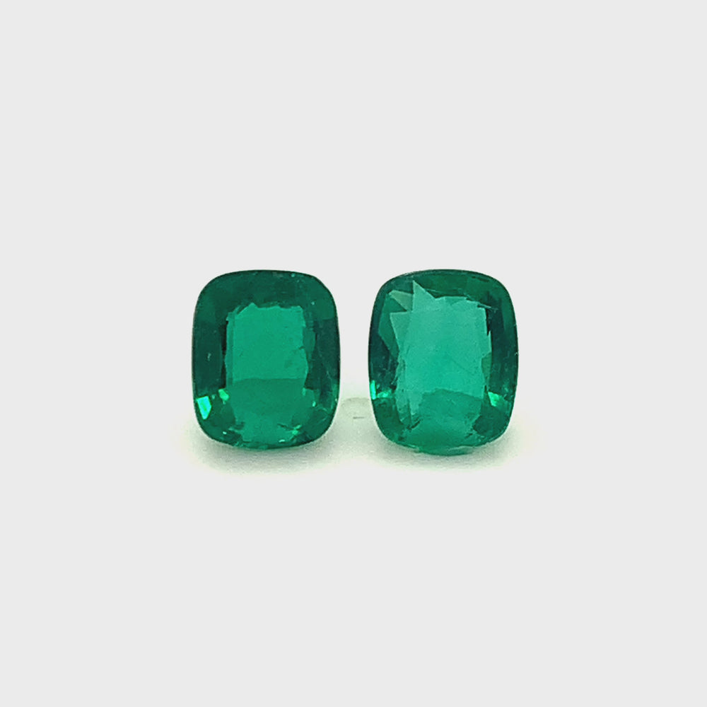 
                  
                    Load and play video in Gallery viewer, 9.83x8.17x4.46mm Cushion Emerald Pair (2 pc 5.04 ct)
                  
                