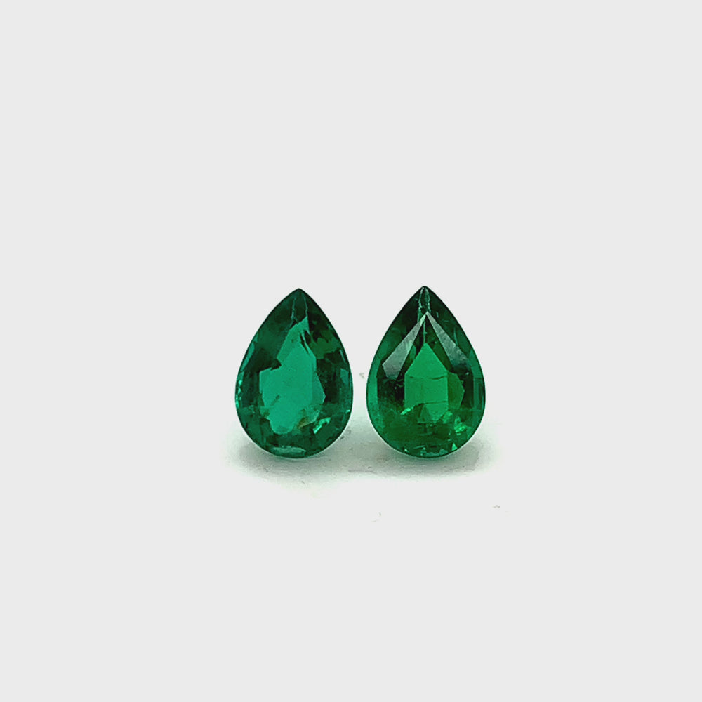 
                  
                    Load and play video in Gallery viewer, 9.80x6.80x0.00mm Pear-shaped Emerald (2 pc 3.12 ct)
                  
                