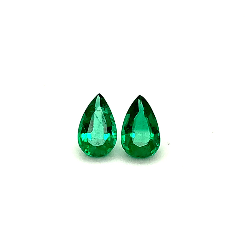 
                  
                    Load and play video in Gallery viewer, 10.30x6.40x0.00mm Pear-shaped Emerald (2 pc 2.87 ct)
                  
                